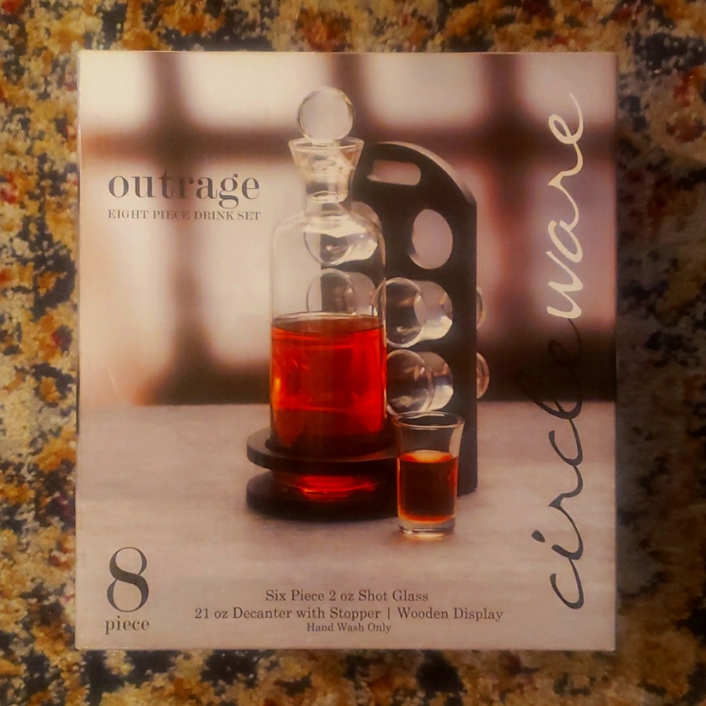 8 piece glass Drink Set. $35